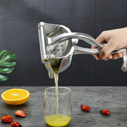 JuicePress™ – Exprimidor Metálico para Jugo Natural y Saludable